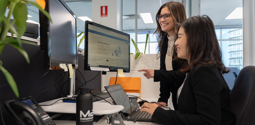 Bookkeeper and accountant looking at a computer