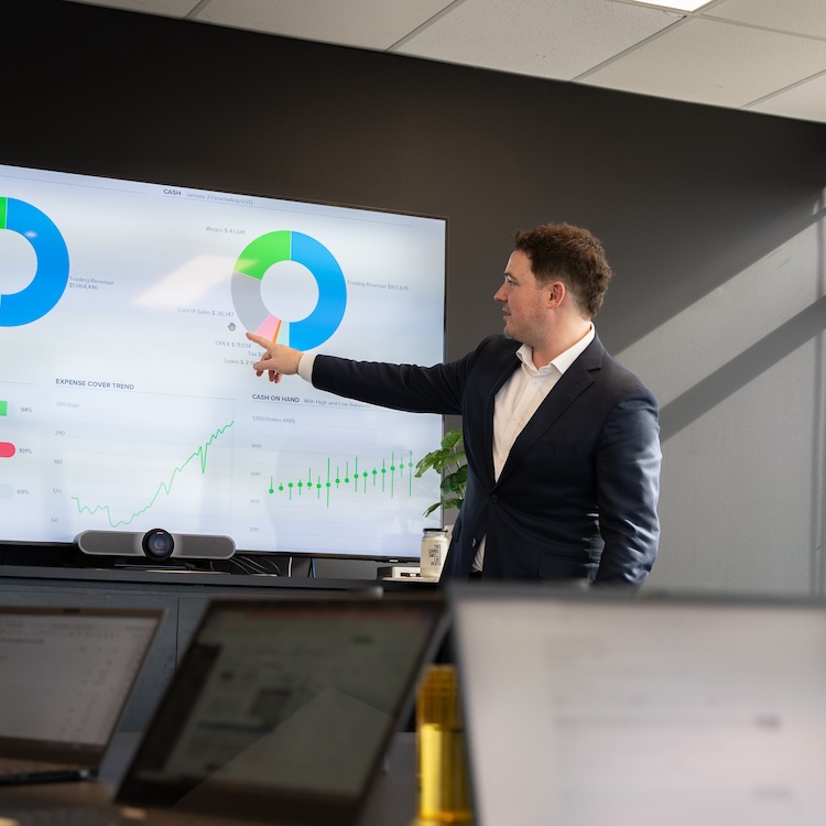 Mace performing a business valuation as part of his business succession planning services