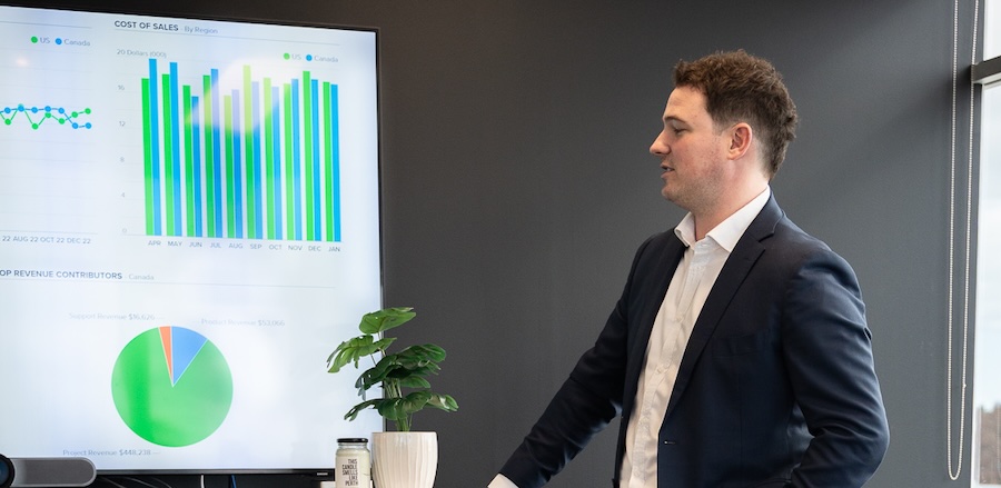 Mace Turco delivering a financial report