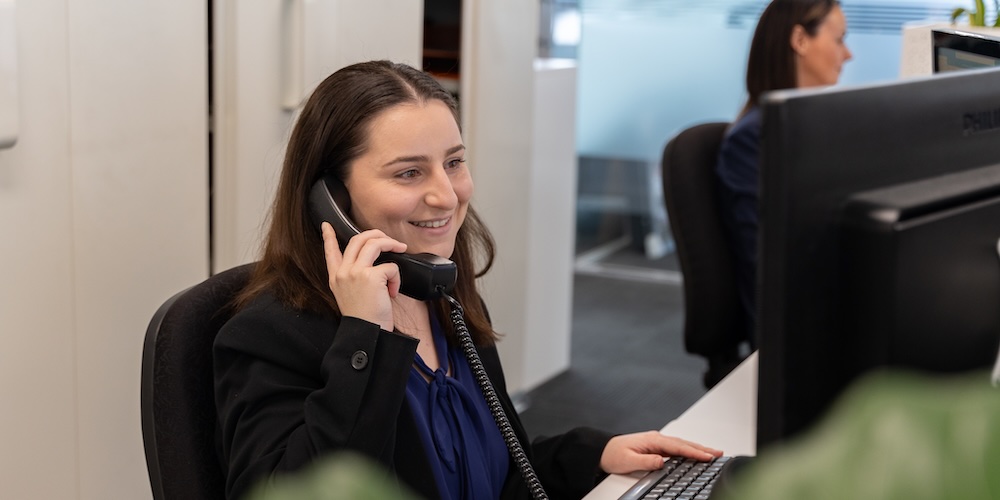 M2 advisor explaining what does an outsourced CFO do on the phone